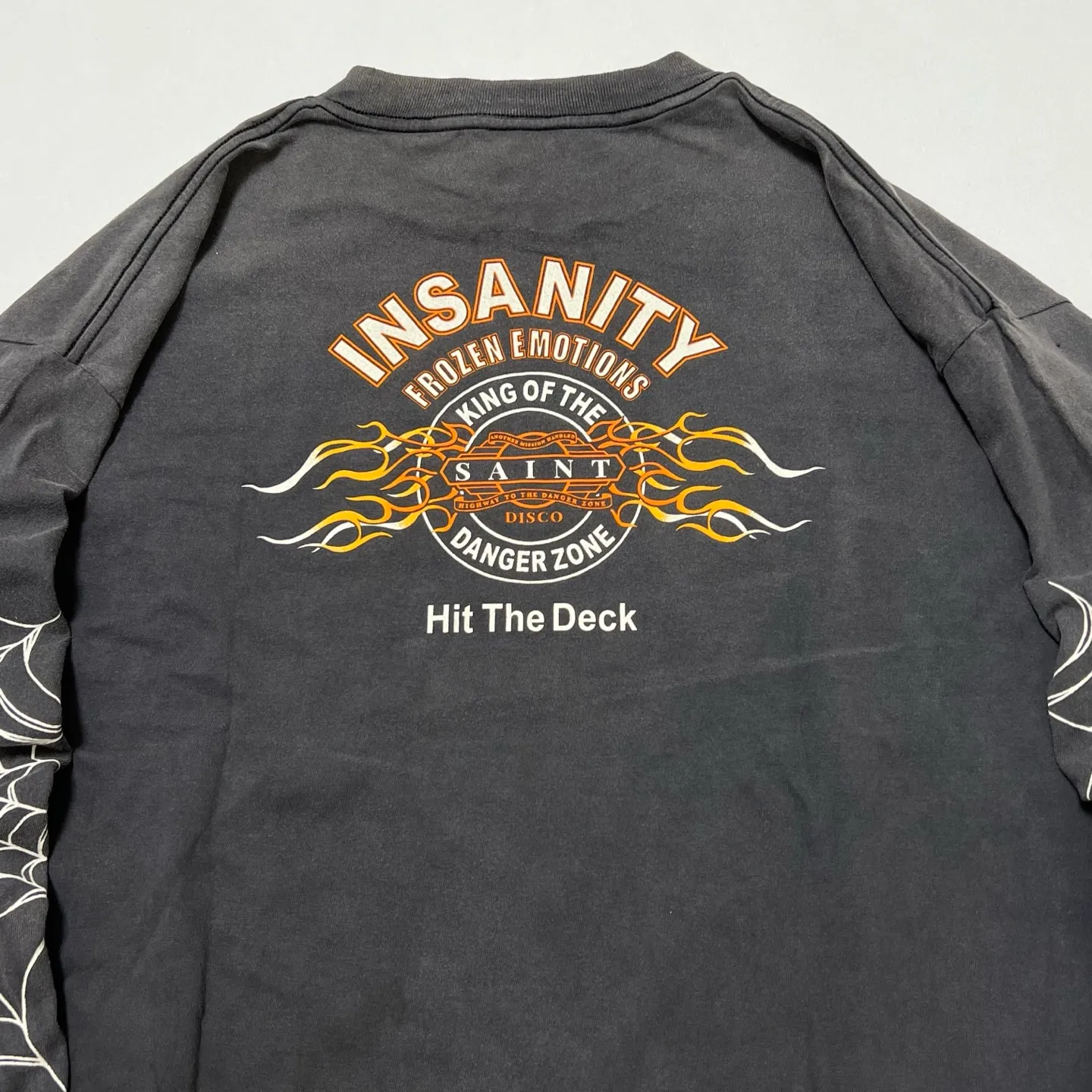 SAINT Mxxxxxx × TEFLON DISCO ML_LS TEE/INSANITY/BLK Spider Web INSANITY Distressed Long Sleeves Washed Black S-XL Ready-to-wear Assute dyeing Maliu water spray fading treatment Customized TEFLON DISCO co-branded accessories Hand-splashed ink Wormhole fraying treatment Authentic level printing process